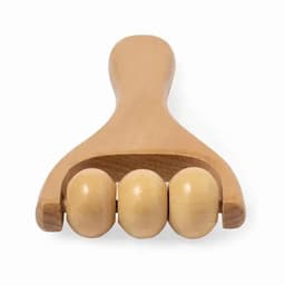 A wooden massager with three rounded rollers and a curved handle, crafted from light-toned wood.