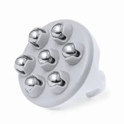 A massage attachment with six metallic balls on a white base, designed for use with a massage device.