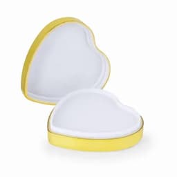 A heart-shaped jewellery box in white with a gold rim, slightly open to reveal its interior.