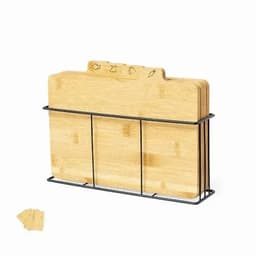 A set of bamboo cutting boards in a black wire holder, featuring engraved icons on the boards.