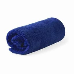 A rolled navy blue towel, soft and fluffy, positioned on a white background. It has no visible logos or text.