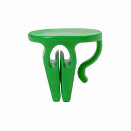 A green clip with a unique design featuring a handle and two prongs for securing items.