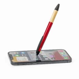 A stylus pen with a red barrel and bamboo accent balances on a smartphone screen, showcasing its functionality.