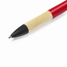 A red and black pen with a bamboo grip, featuring a rounded black tip and a sleek design.