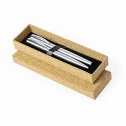A pen set in silver colour, presented in a kraft-style box with a black lining. The box is open, revealing the contents.