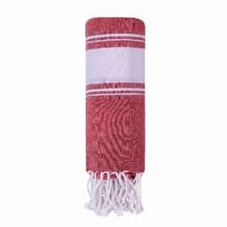 A rolled red towel with white stripes and fringed edges, featuring an overall textured pattern.