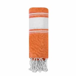 An orange towel with white stripes, rolled and featuring fringe detailing at one end. It has a simple, classic design.