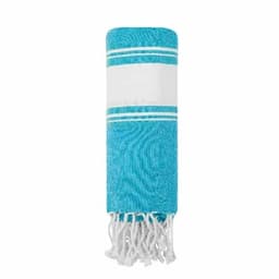 A blue and white striped beach towel, featuring fringe detailing at the ends. It has a vibrant turquoise colour.