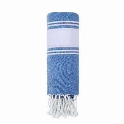 A rolled towel in blue and white with decorative stripes and tassels at the end. It features a branding logo.