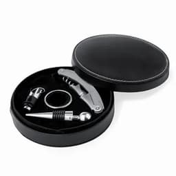 A bottle opener and wine accessories set in a round black box with a textured lid. The items are silver and black.