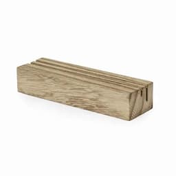A wooden block, rectangular in shape, with a light brown finish and visible wood grain texture.