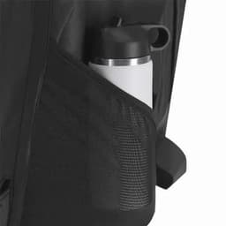 A black backpack with a mesh side pocket holding a silver and black drink bottle.