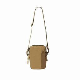 A tan crossbody bag with a textured surface and an adjustable strap, featuring a front pocket and branding.