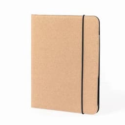 A notebook cover in a natural cork finish with a black elastic band. It has a sleek, minimalist design.