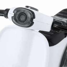 A close-up of a white novelty item featuring a black handle and control component.