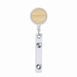 A badge holder with a circular wooden top and a silver metal clip below, featuring two snap buttons.