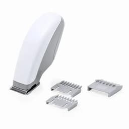 A hair clipper in white with two grey guiding combs beside it. The clipper has a sleek design and a shiny finish.