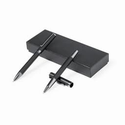 A set of black pens displayed on a black box, one pen is capped and the other is uncapped.