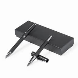 A set of two black pens displayed on a sleek black box. The pens have a stylish design and chrome accents.