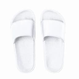 A pair of white slide sandals featuring a simple design and a textured sole. They have a smooth, glossy finish.