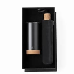 A drink bottle in a black box, featuring a sleek black design with a cork base and a protective sleeve.