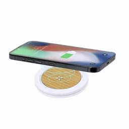 A wireless charger with a wooden surface and white base, with a smartphone placed above, showing charging status.