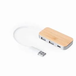 A device hub with a bamboo top and silver base, featuring multiple USB ports and a connected USB cable.