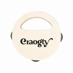 A round wooden product with a handle, featuring a black logo on a light wood surface.