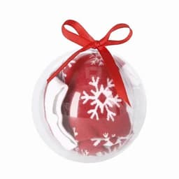 A red bauble with white snowflake patterns, contained in a clear plastic sphere with a red ribbon.