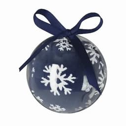 A decorative clear ball contains navy socks with white snowflake patterns, tied with a navy ribbon.