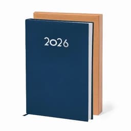 A navy blue diary with the year 2026 embossed on the front and a kraft paper cover in the background.