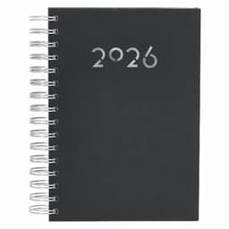 A notebook with a black cover, featuring silver numbers "2026" on the front and a spiral binding on the side.