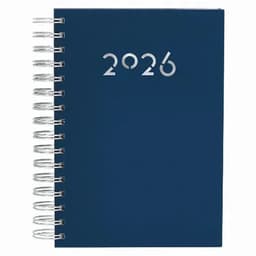 A spiral-bound notebook in navy blue with silver numbers indicating the year 2026 on the cover.