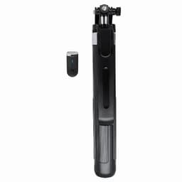 A black multifunctional tool with a sleek design, accompanied by a small attachment. Features a branding logo.