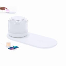 A drink bottle with a glass top, white base, and a wireless charging pad, featuring a logo.