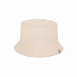 A bucket hat in a light beige colour with a rounded crown and wide brim. It features a small logo tag.