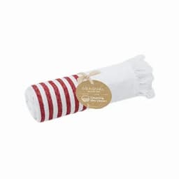 A rolled towel featuring red and white stripes, with a natural tag attached, emphasising environmental sustainability.