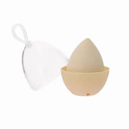 A storage container with a beige egg-shaped product inside, featuring a clear lid.