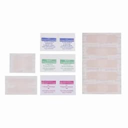 A selection of adhesive pads in various sizes and colours, featuring a logo on the packaging.