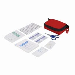A first aid kit in a red case, containing various medical supplies including bandages, scissors, and antiseptic wipes.