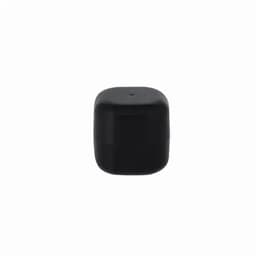 A black square container with a smooth top and a small hole, featuring a simple logo on one side.