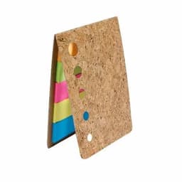 A cork notebook with brightly coloured sticky notes peeking out from the side, featuring a rounded design.