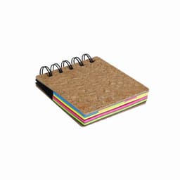 A cork notebook with black spiral binding and vibrant coloured page edges in pink, green, blue, and yellow.