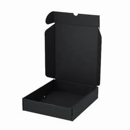 A black cardboard box with an open flap, ready for packing. Minimal design, no visible branding.