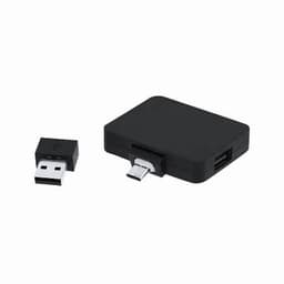 A black multi-port USB adapter with a micro USB connection and a standard USB connector beside it.