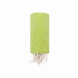 A rolled green towel with white tassels at one end. The towel has a textured surface.