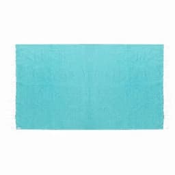 A bright aqua-blue beach towel with fringed edges, featuring a textured surface. It has a logo in one corner.