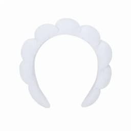 A white headband featuring a scalloped design. It has a soft texture and a simple, elegant appearance.