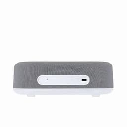 A speaker with a grey fabric exterior and a white base, featuring control buttons and a USB-C port.