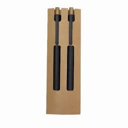 A black drink bottle set with two bottles and a cardboard packaging, featuring a simple design and brass accents.